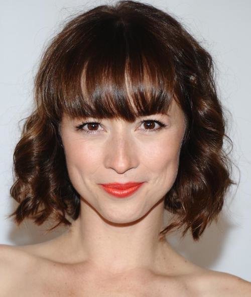 wearing blunt bangs