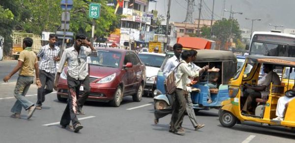 Indians crossing road