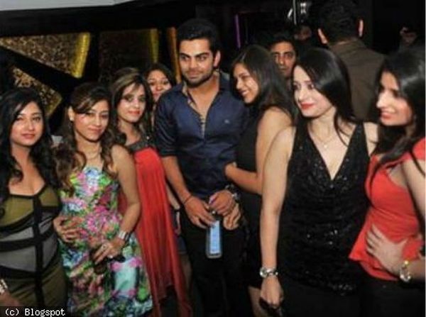 Virat Kohli with girls at IPL party