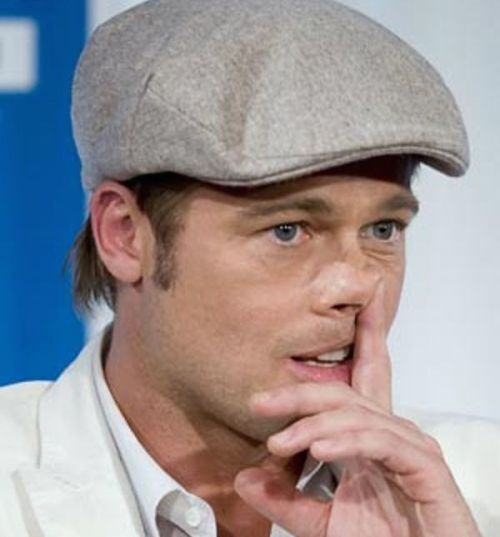 Brad Pitt picking nose