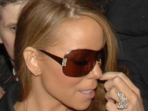 Mariah Carey picking nose
