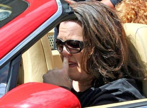 Rosie O'Donnell picking nose