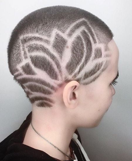 Artistic buzz haircut for women