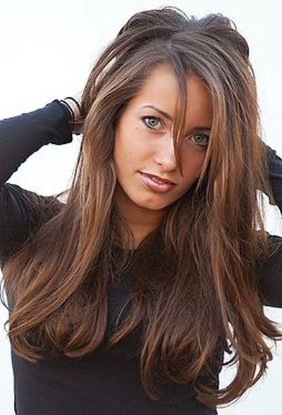 Dark brown hair with lighter brown highlights for olive skin