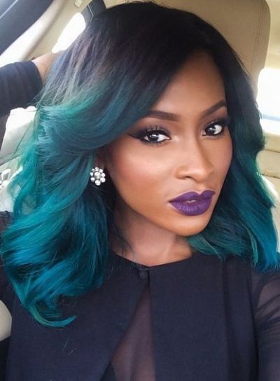 Electric blue hair color on a long bob hairstyle