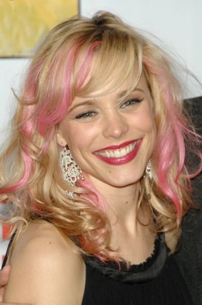 Light golden blonde hairstyle with pink highlights