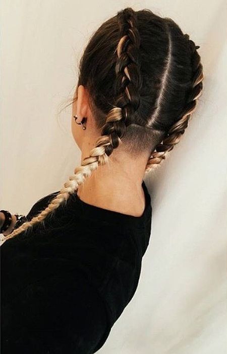 Long braids and shorn nape