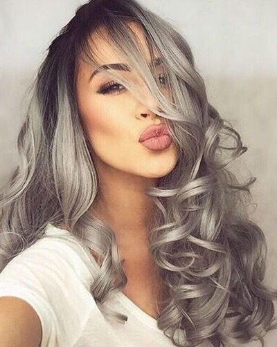 Salt and pepper gray on big wavy hairstyle