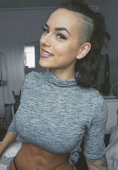 Shaved haircut for women with ponytail