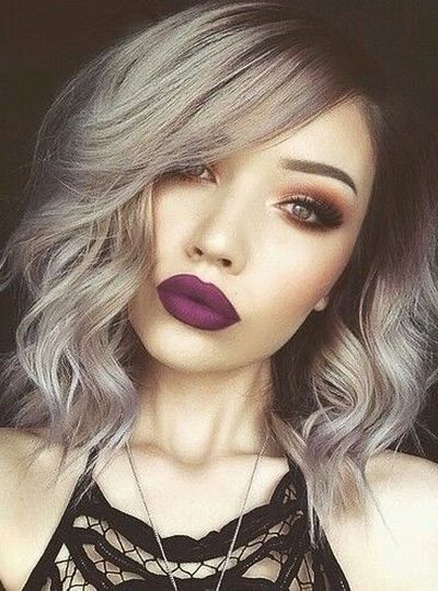 Short curled silver grey hair