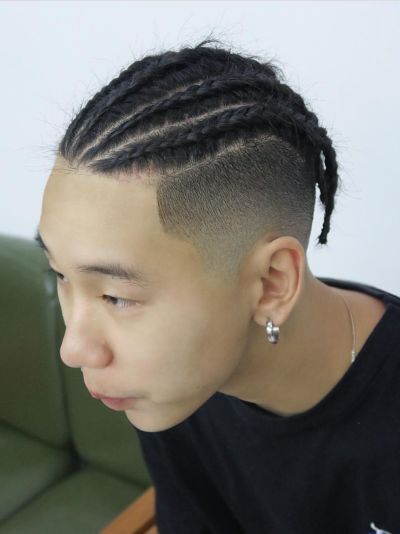 Cornrows and taper fade haircut