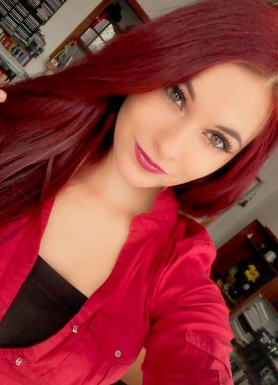 Deep burgundy hair color for warm skin tone