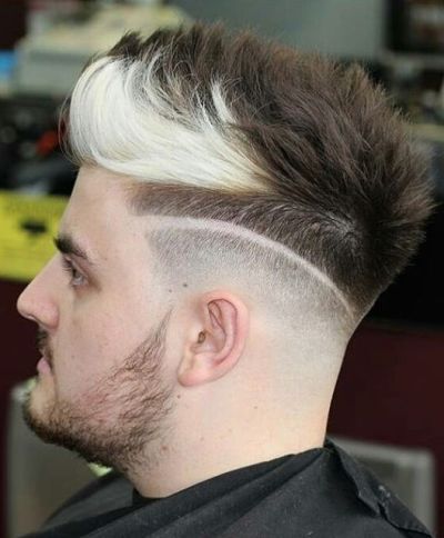 High fade cut with white streak