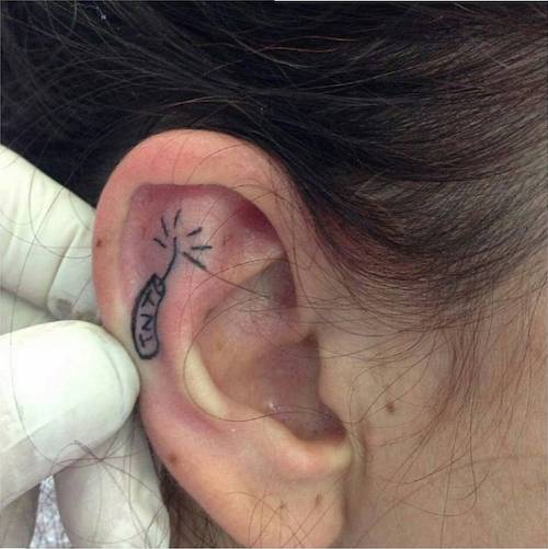 ear micro tattoo tnt