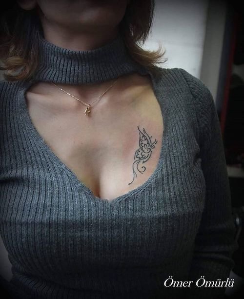 breast tattoo meaning