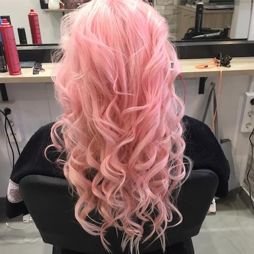 curly pastel pink hair color