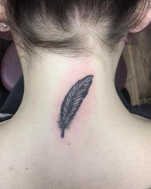 feather neck tattoo meaning
