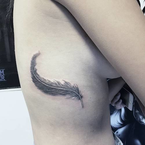 side feather tattoo meaning