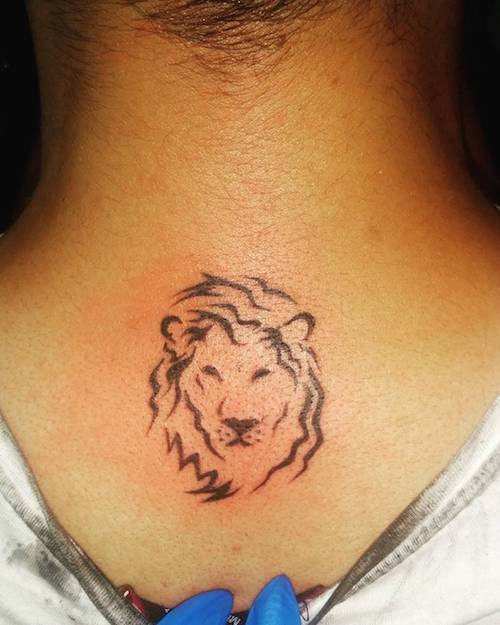 lion neck tattoo meaning