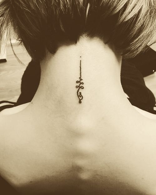 back of neck tiny tattoo - unalome