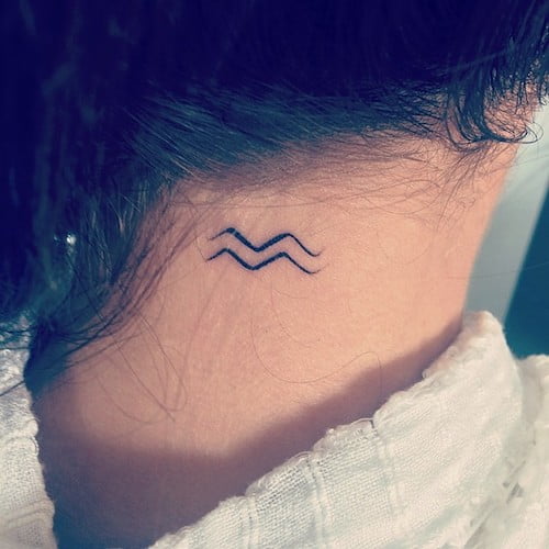 back of neck tiny tattoo - waves