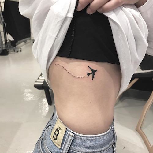 side boob tiny tattoo - airplane