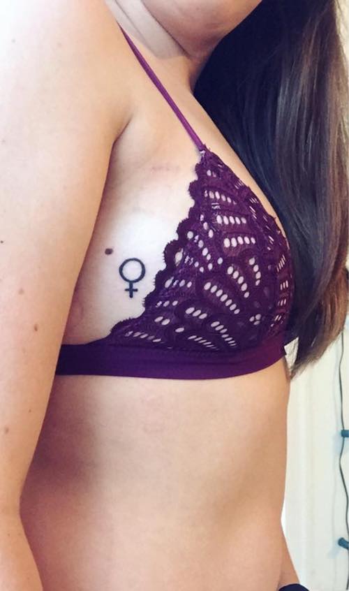 side boob tiny tattoo - female