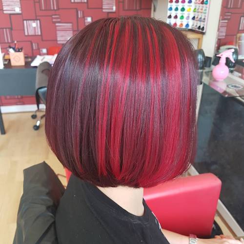 bob haircut red highlights