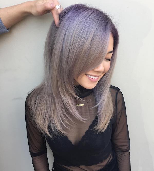 Ash blonde balayage with lilac highlights