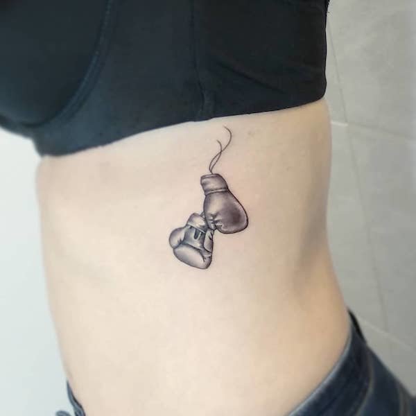 boxing gloves side boob tattoo