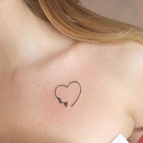 flower heart collarbone tattoo