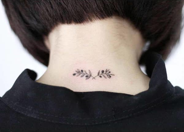 vine back of neck tattoo