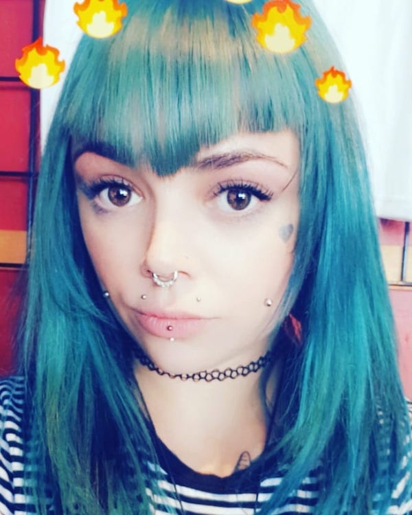 Widows peak turquoise hair